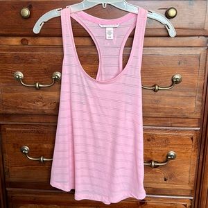 Pink tank top by Victoria’s Secret. Light, thin material and very comfy.
